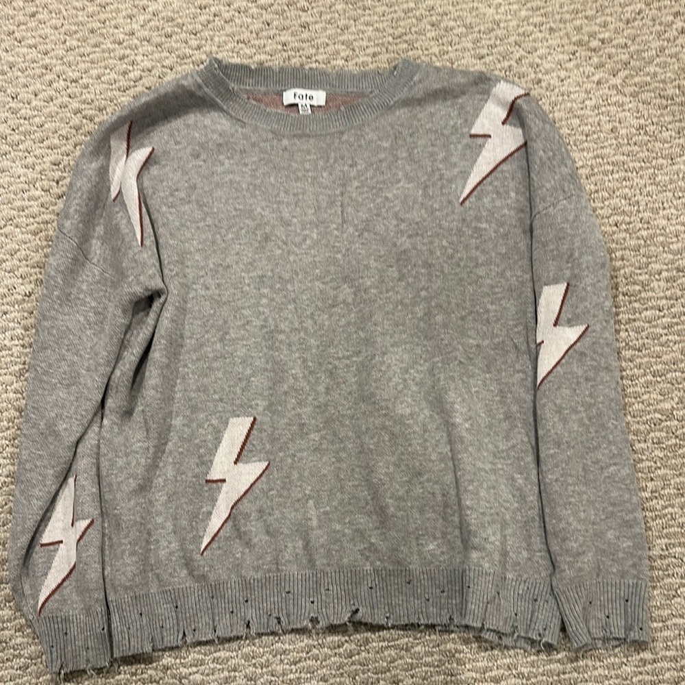Fate Women’s Gray Sweater with Lightning Bolt Design